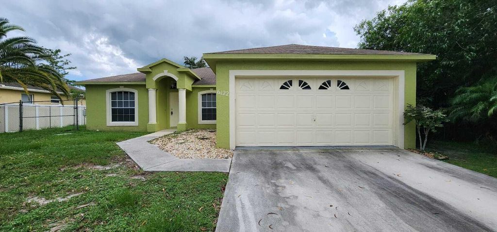 Photo of 6122 NW E Deville Circle, Port Saint Lucie, FL 34986 (MLS # R11152752)