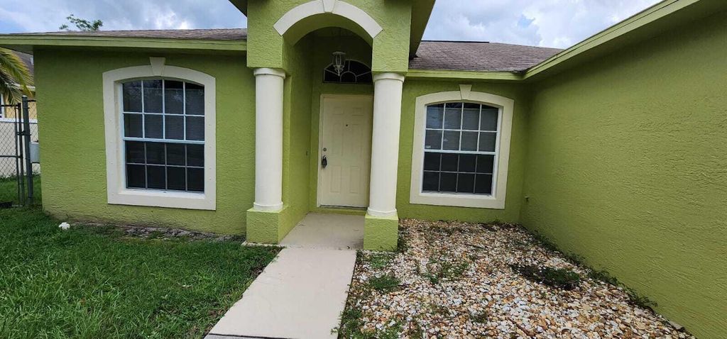 Photo of 6122 NW E Deville Circle, Port Saint Lucie, FL 34986 (MLS # R11152752)