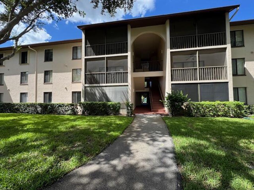 Photo of 207 Foxtail Drive #C1, Greenacres, FL 33415 (MLS # R11113277)