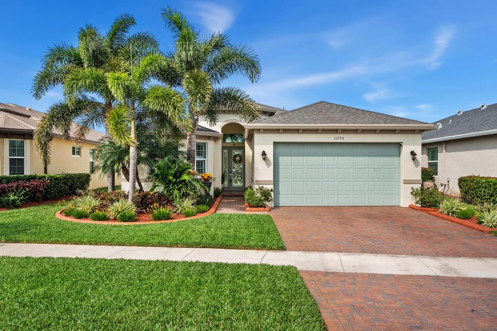 Photo of 11234 SW Lake Park Drive, Port Saint Lucie, FL 34987 (MLS # R10966763)