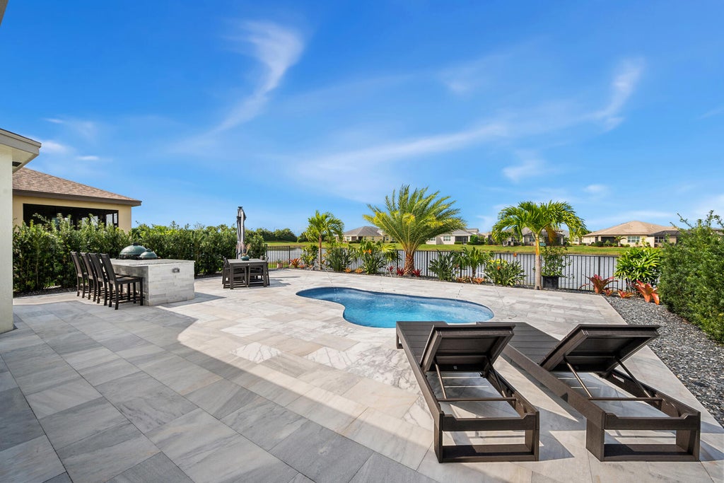 Photo of 11234 SW Lake Park Drive, Port Saint Lucie, FL 34987 (MLS # R10966763)