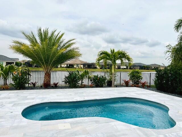 Photo of 11234 SW Lake Park Drive, Port Saint Lucie, FL 34987 (MLS # R10966763)