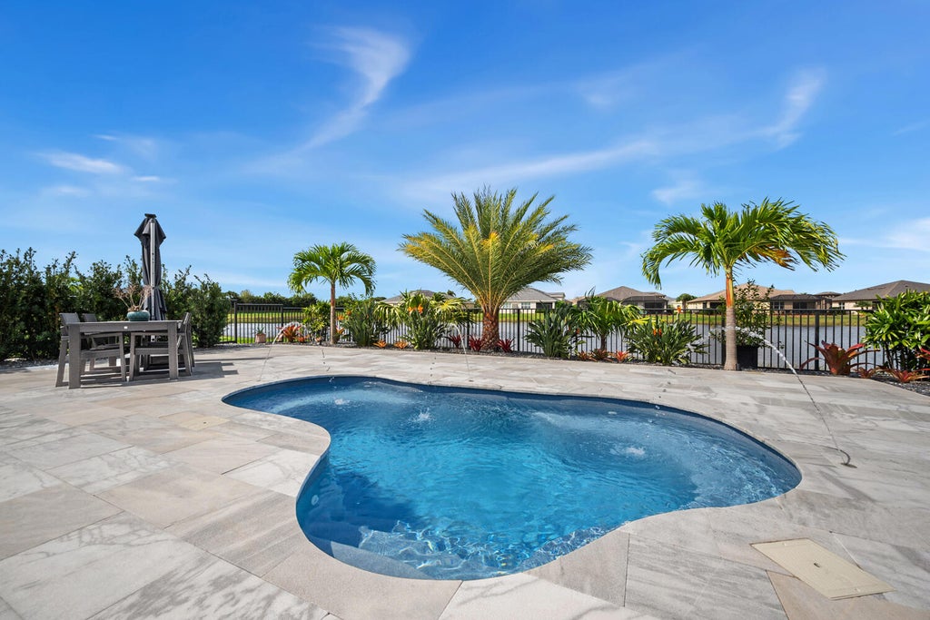 Photo of 11234 SW Lake Park Drive, Port Saint Lucie, FL 34987 (MLS # R10966763)