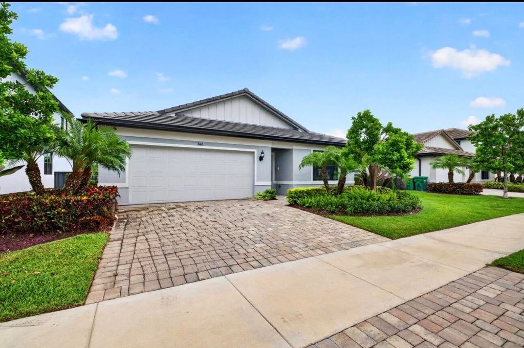 Photo of 3165 Tamarind Drive, Lauderdale Lakes, FL 33311 (MLS # B26035278)