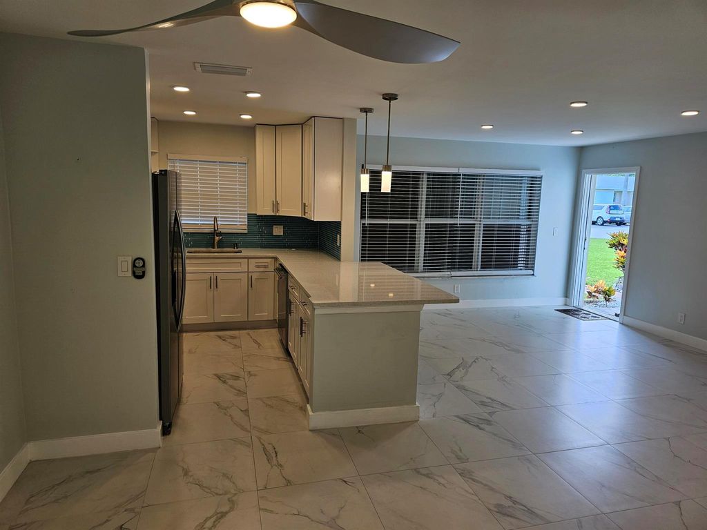 Photo of 3211 Park Lane #B, Boynton Beach, FL 33435 (MLS # R10883583)