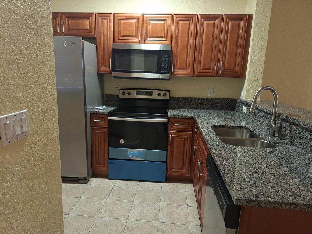 Photo of 4202 Napoli Lake Drive, Riviera Beach, FL 33410 (MLS # R11034150)