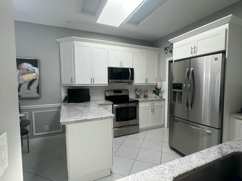 Photo of 7680 Mansfield Hollow Road, Delray Beach, FL 33446 (MLS # B26005424)