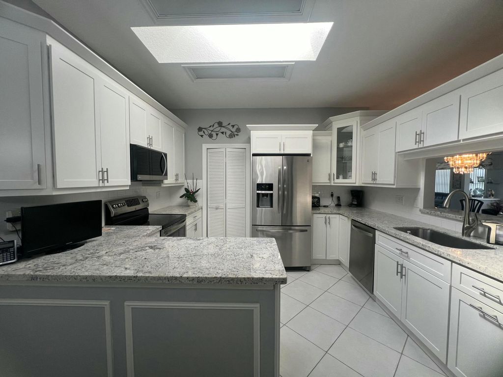 Photo of 7680 Mansfield Hollow Road, Delray Beach, FL 33446 (MLS # B26005424)