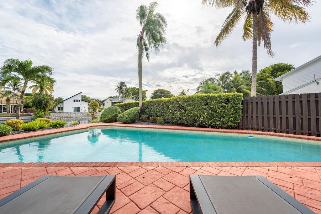 Photo of 610 SW 101st Ave, Plantation, FL 33324 (MLS # F10533028)