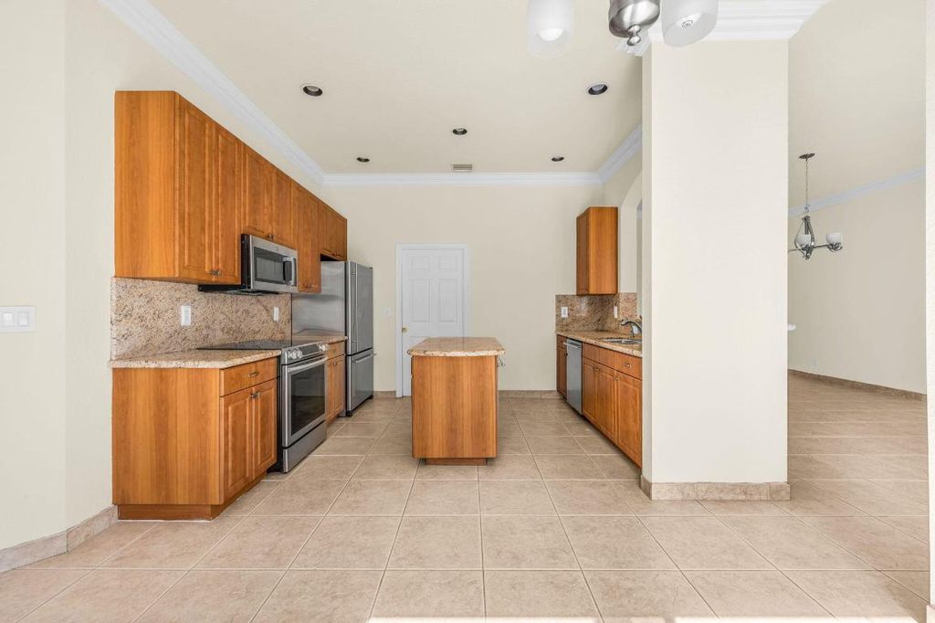 Photo of 9960 Boynton Gardens Way, Boynton Beach, FL 33437 (MLS # R11142007)