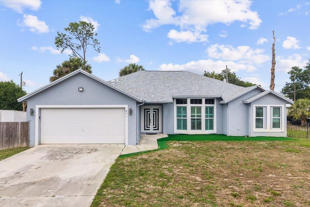 Photo of 471 NW Sherbrooke Avenue, Port Saint Lucie, FL 34983 (MLS # B26011778)