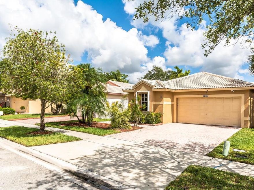 BEAUTIFULLY DECORATED UPDATED 3/2/2 HOME IN THE 5 STAR RESORT-LIKE COMMUNITY OF PEMBROKE ISLES!  NEUTRAL TILE, BERBER CARPET & LAMINATE WOOD FLOORING; ALL LIGHT FIXTURES & CEILING FANS REPLACED; UPDATED KITCHEN WITH GRANITE COUNTERS & STONE TILE BACK-SPLASH, STAINLESS STEEL APPLIANCES; UPDATED MASTER BATHROOM AND SECOND BATHROOM; COVERED & SCREENED PATIO OVERLOOKING VERY PRIVATE TROPICAL "ISLAND OASIS"; ACCORDION SHUTTERS; MINT CONDITION. ALARM, CABLE, POOL, GYM, BEACH, ETC. INCLUDED IN MONTHLY FEE.