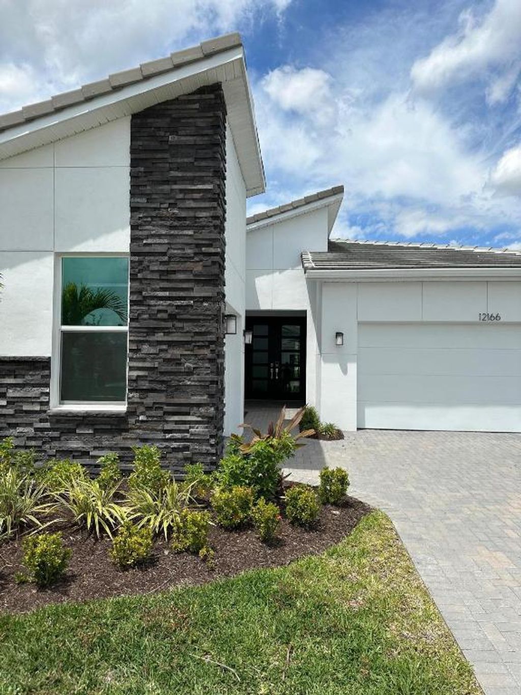 Photo of 12166 Viridian Boulevard, Port Saint Lucie, FL 34987 (MLS # R11158449)