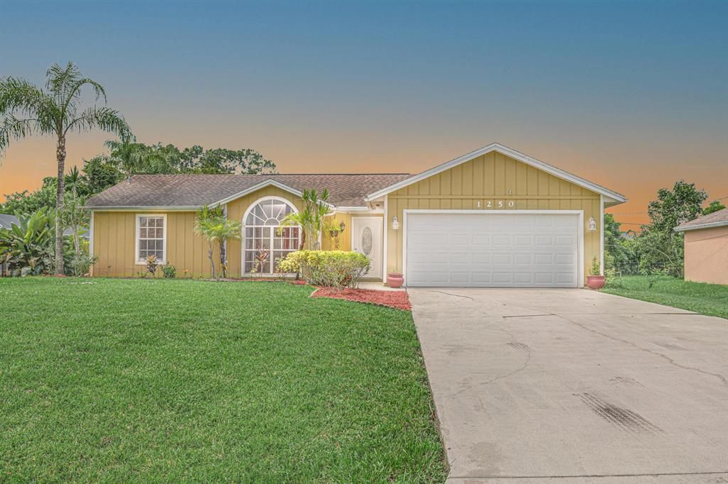 Photo of 1250 SW Janette Avenue, Port Saint Lucie, FL 34953 (MLS # R10736774)