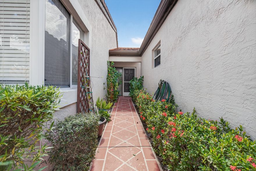 Light, bright 2/2 villa with attached one car garage. Open kitchen with granite counters and wood cabinets. Wood laminate floors in main living areas. Carpet in bedrooms. Unit can be rented with furniture on premises or completely unfurnished. Screened Florida room is a perfect relaxation or breakfast spot on sunny days. Laundry room with full washer and dryer inside. Ample closet space. 2 additional parking spaces in driveway. Huntington Pointe is a an active adult community that features a 53,000 square foot clubhouse. The 600 seat theater offers liveentertainment and movies year 'round. You'll also find a fitness center, card rooms, billiard room, aerobics room, bocce courts, pickleball courts, Har-Tru tennis courts (scheduled for December of 2025), 4 heated outdoor pools, heated