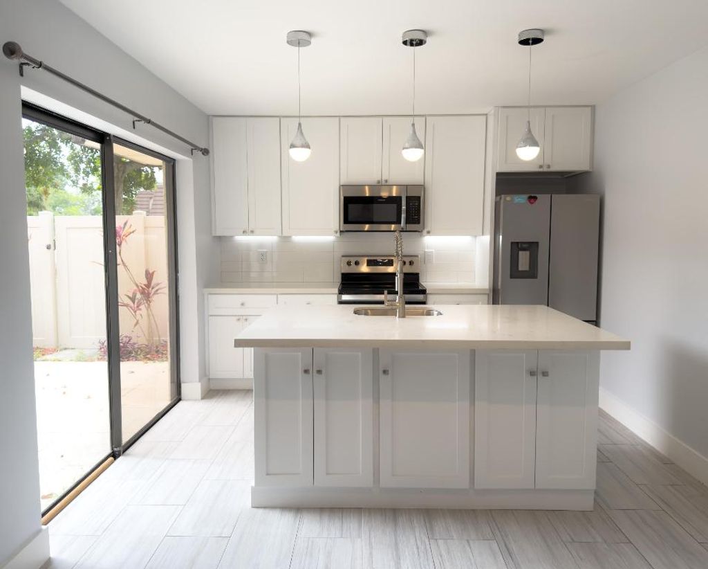 Photo of 7724 77th Way, West Palm Beach, FL 33407 (MLS # R11156966)