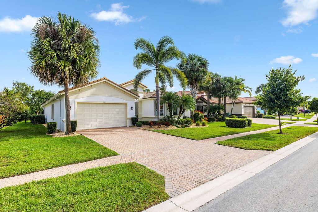 Photo of 9362 Isles Cay Drive, Delray Beach, FL 33446 (MLS # R11145838)