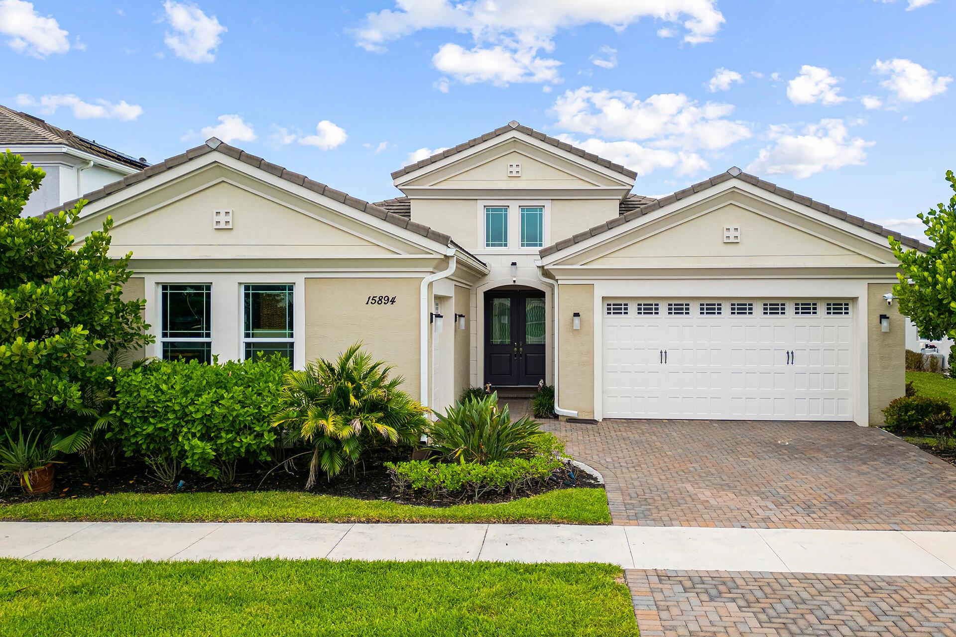 This beautiful 4-bedroom, 3-bathroom single-story home is located on a quiet cul-de-sac in Westlake with peaceful lake views. The open layout is filled with natural light and features a stylish kitchen with quartz countertops and plenty of space for cooking and gathering. Enjoy seamless indoor-outdoor living in a vibrant community. Westlake's resort-style amenities include a lagoon pool, tower slide, lap pool, splash pad, shady cabanas, basketball courts, dog park, event lawns, adventure playground, and concert pavilion. Florida's new city brings fun, comfort, and connection to everyday life.