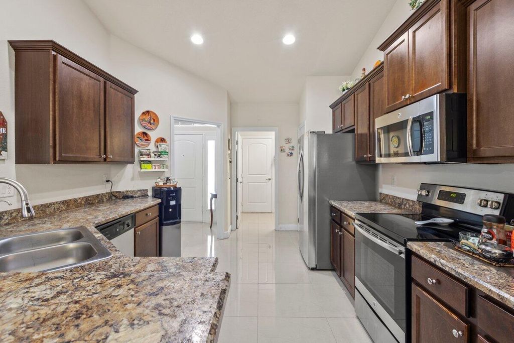 Photo of 1441 SW Oriole Lane, Port Saint Lucie, FL 34953 (MLS # R11084925)