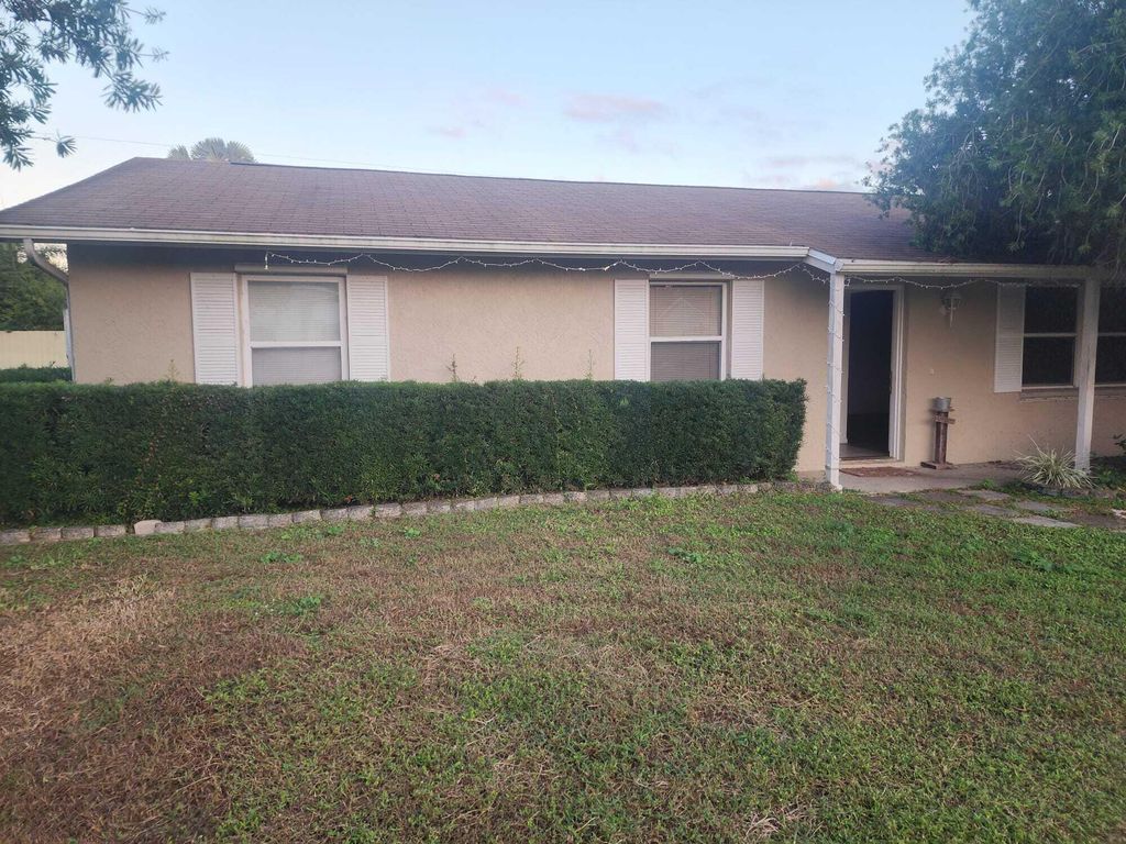 Photo of 1197 SW Heather Street, Port Saint Lucie, FL 34983 (MLS # B26007072)