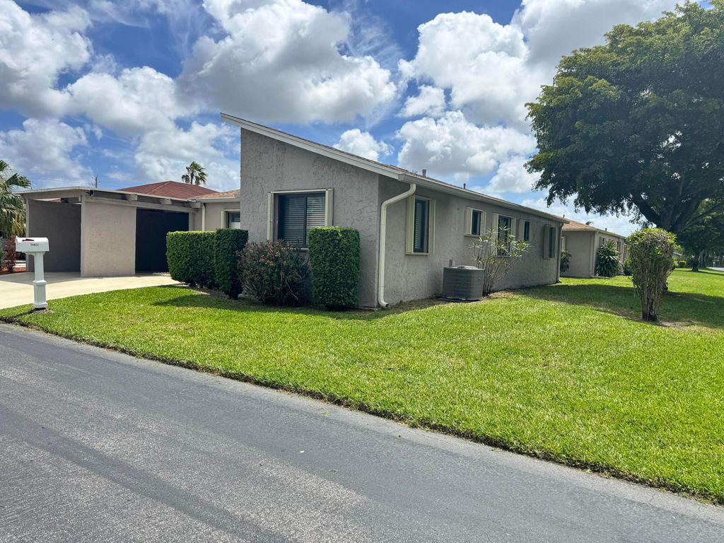 Photo of 14822 Wildflower Lane, Delray Beach, FL 33446 (MLS # B26009942)
