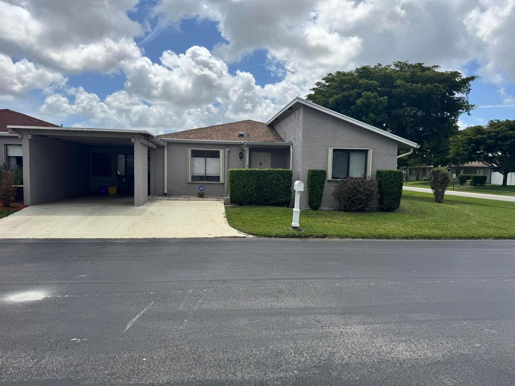 Photo of 14822 Wildflower Lane, Delray Beach, FL 33446 (MLS # B26009942)