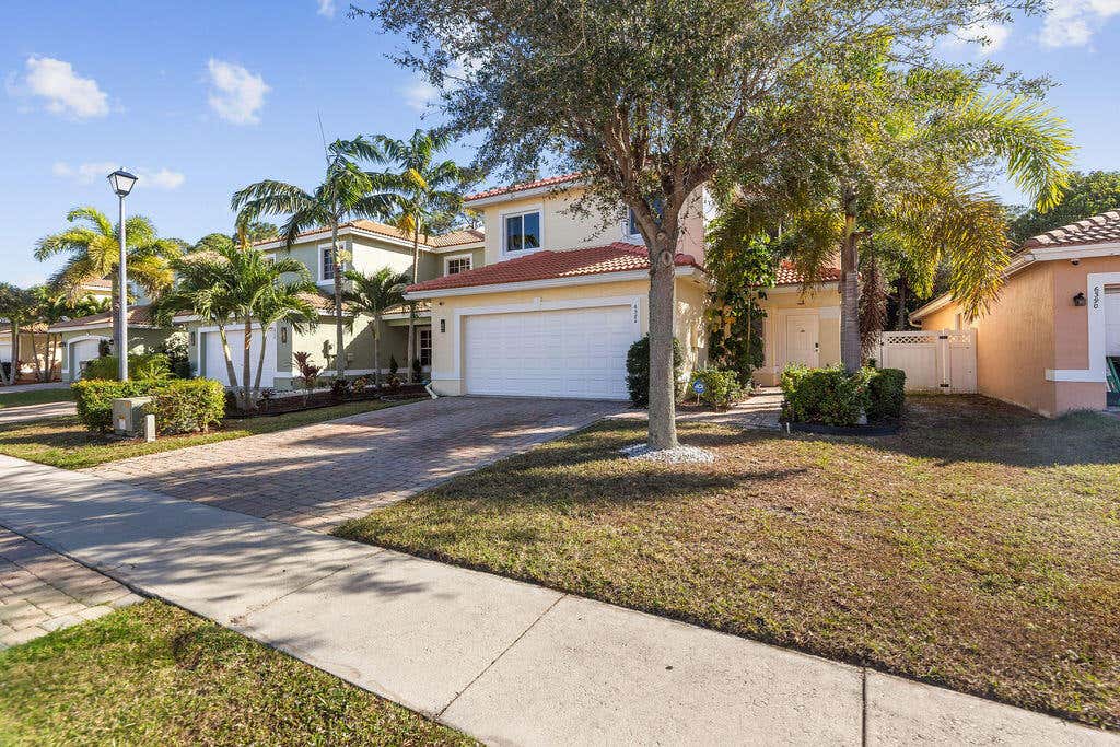 Photo of 6384 Adriatic Way, West Palm Beach, FL 33413 (MLS # B26062619)