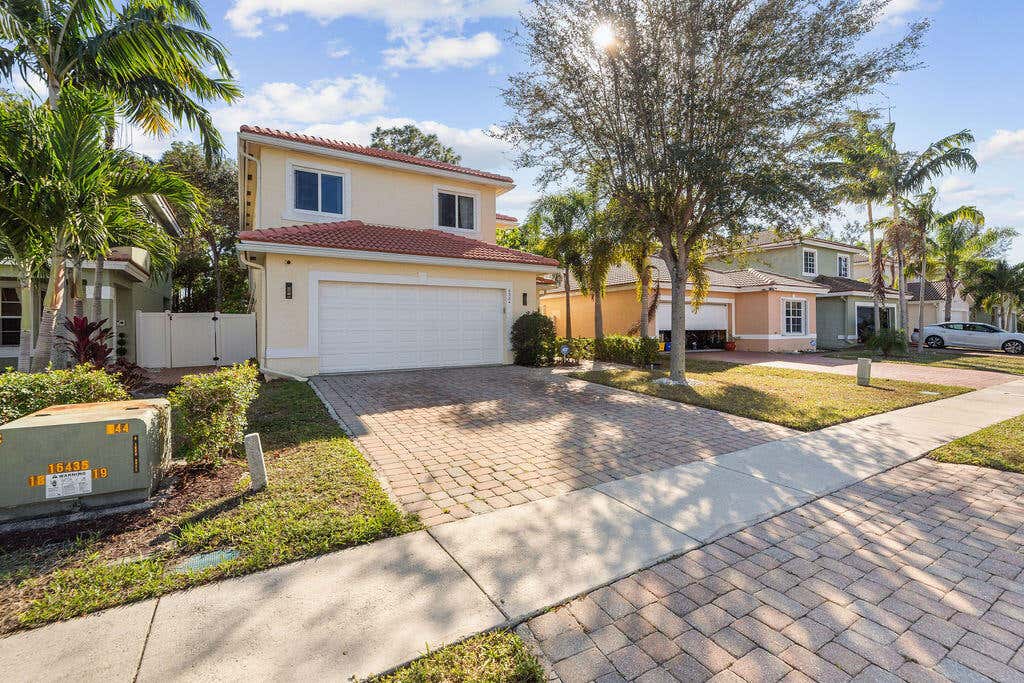 Photo of 6384 Adriatic Way, West Palm Beach, FL 33413 (MLS # B26062619)