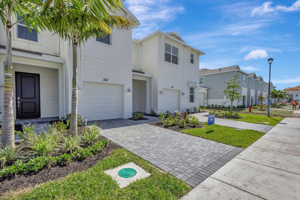 Photo of 512 SE Rivergrass Street, Port Saint Lucie, FL 34984 (MLS # R11073795)