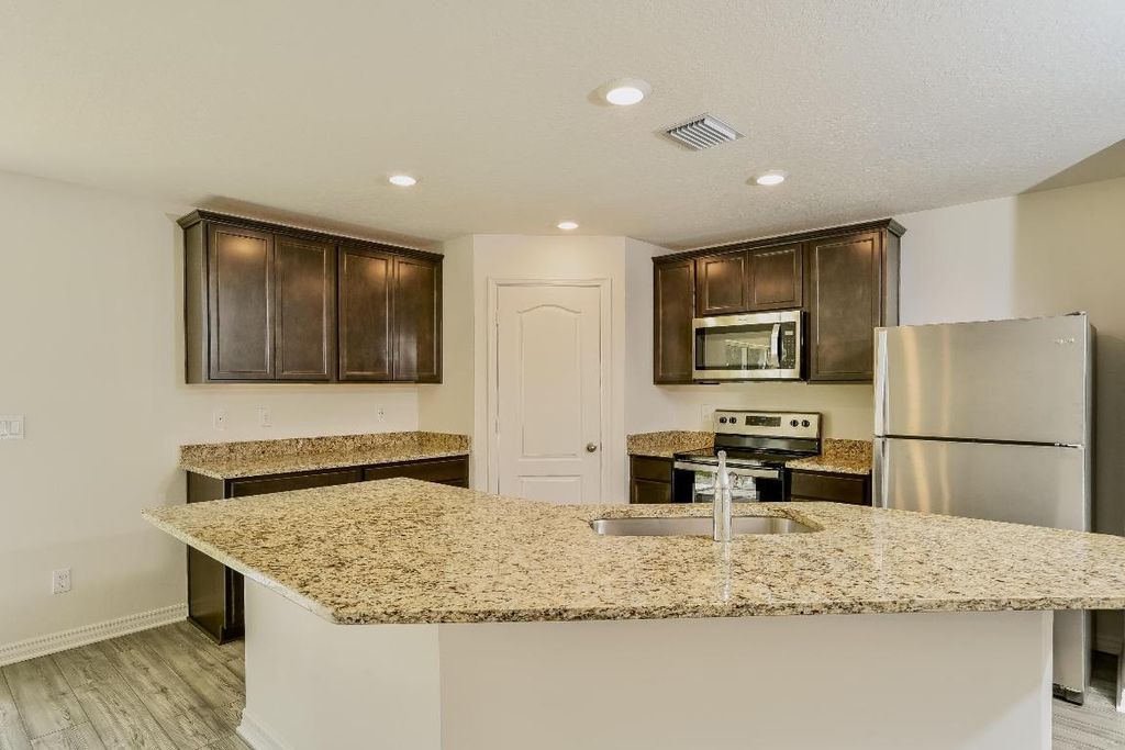 Photo of 962 SE Candle Avenue, Port Saint Lucie, FL 34983 (MLS # R10952112)