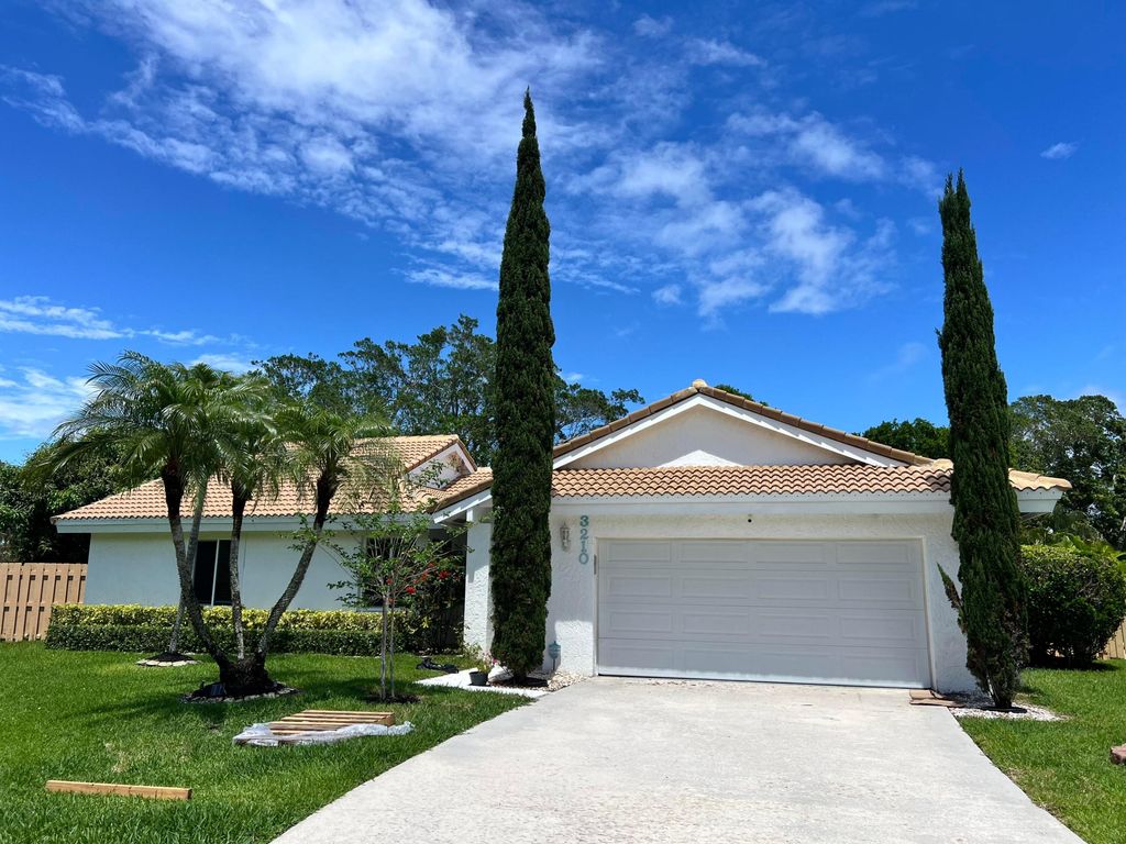 Photo of 3210 NW 23rd Terrace, Boca Raton, FL 33431 (MLS # B26014352)