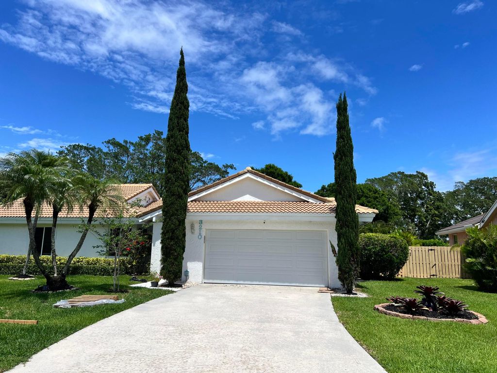 Photo of 3210 NW 23rd Terrace, Boca Raton, FL 33431 (MLS # B26014352)