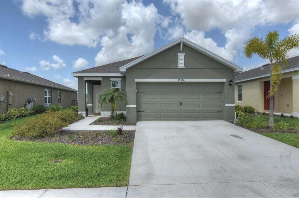 Photo of 10976 SW Robia Way, Port St Lucie, FL 34987 (MLS # R10872062)