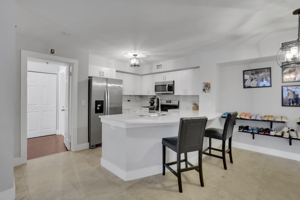 Photo of 3237 CLINT MOORE Road #103, Boca Raton, FL 33496 (MLS # B26077525)