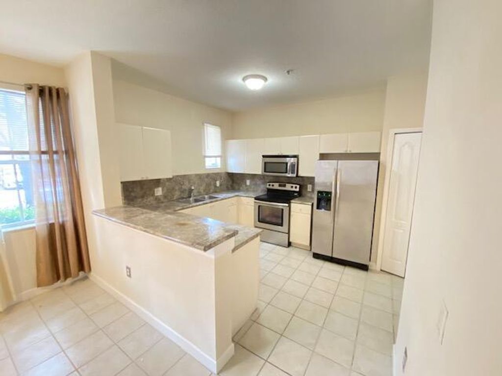 Photo of 2102 Shoma Drive, West Palm Beach, FL 33414 (MLS # B26015320)