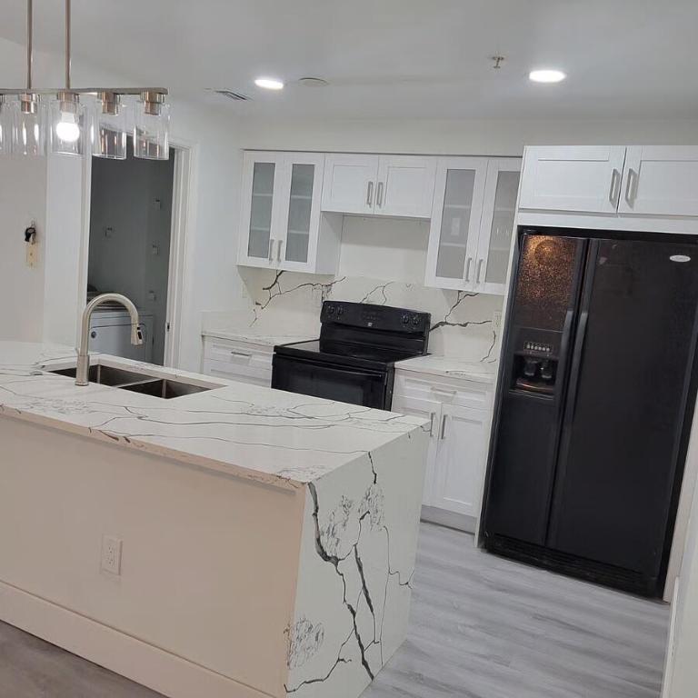 EL-AD POINCIANA CONDO - Residential