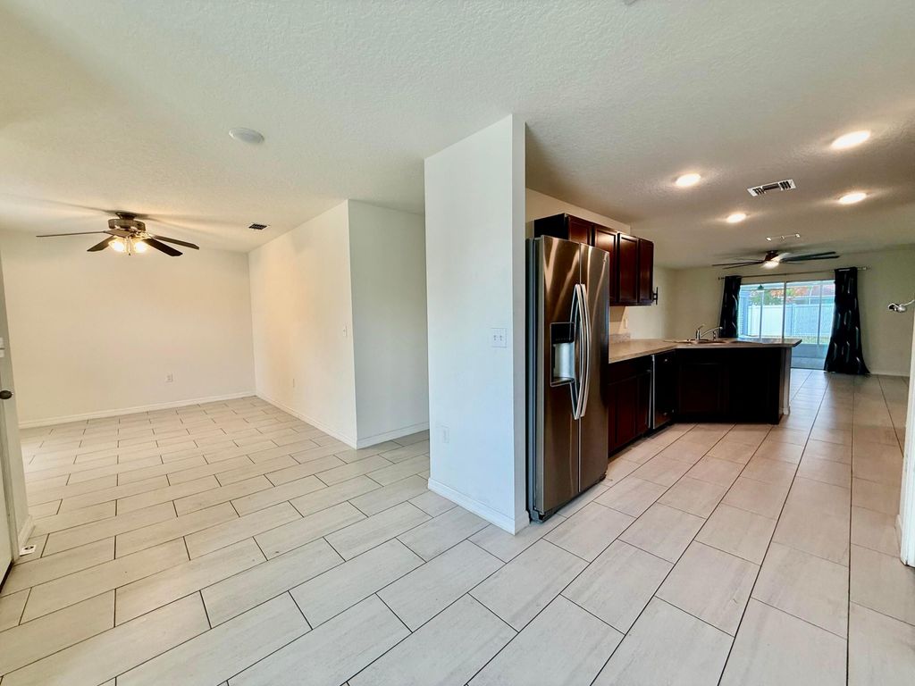 Photo of 949 SW Fisherman Avenue, Port Saint Lucie, FL 34953 (MLS # B26010018)