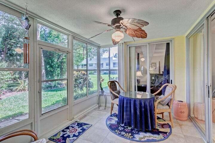 THIS 1ST FLOOR UNIT WITH OPEN KITCHEN AND TILE FLOORS READY TO MOVE IN . GLASS AND SCREENED FLORIDA ROOM OVER LOOKING PRIVATE GARDENS IN A 55 AND OVER VERY ACTIVE COMMUNITY.2 BEDROOM ,2 NEW BATHROOMS UNIT DIRECTLY ACROSS FROM OLYMPIC SIZE POOL AND STEPS TO THE BEACH. CLUBHOUSE ,BBQ AREA, TENNIS, SHUFFLE BOARD , BILLIARD ROOM MANICURED GROUNDS, BOAT SLIPS AVAILABLE TO BUY OR LEASE** NEW BATHROOMS AND LAMINATE WOOD FLOORS PUT IN AFTER PHOTOS TAKEN **********