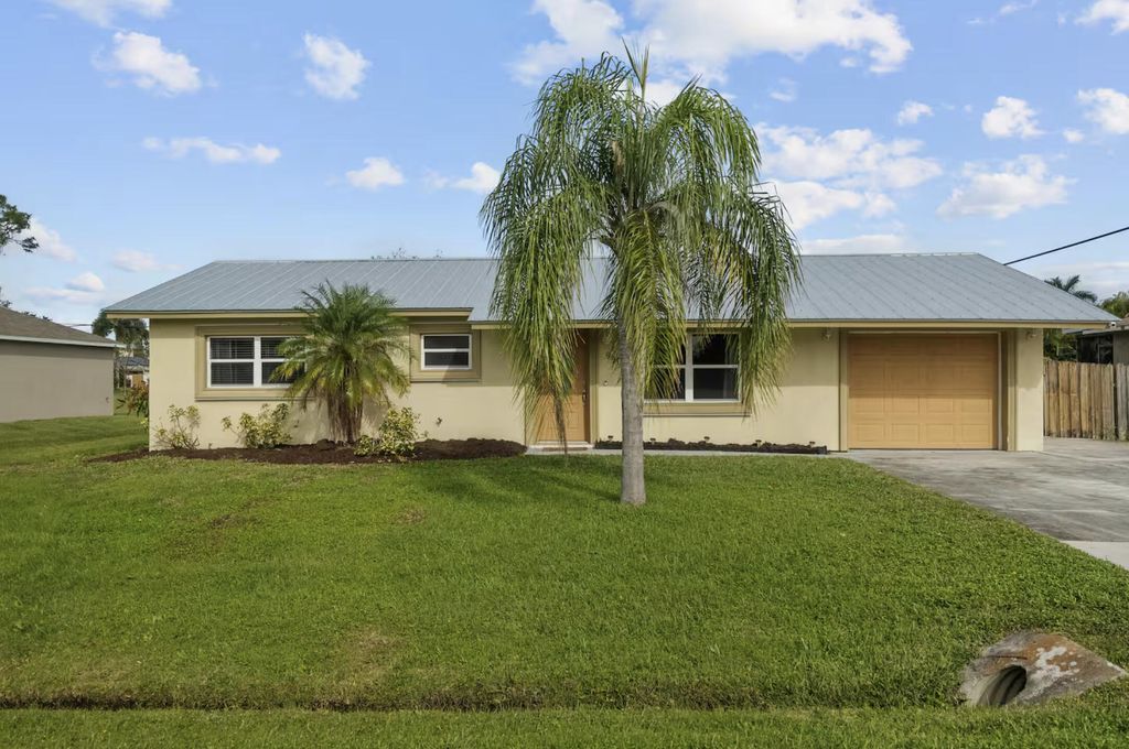 Photo of 991 SE Walters Terrace, Port Saint Lucie, FL 34983 (MLS # R11142245)