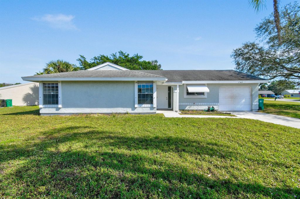 Photo of 749 SW Longleaf Place, Port Saint Lucie, FL 34953 (MLS # R11057116)