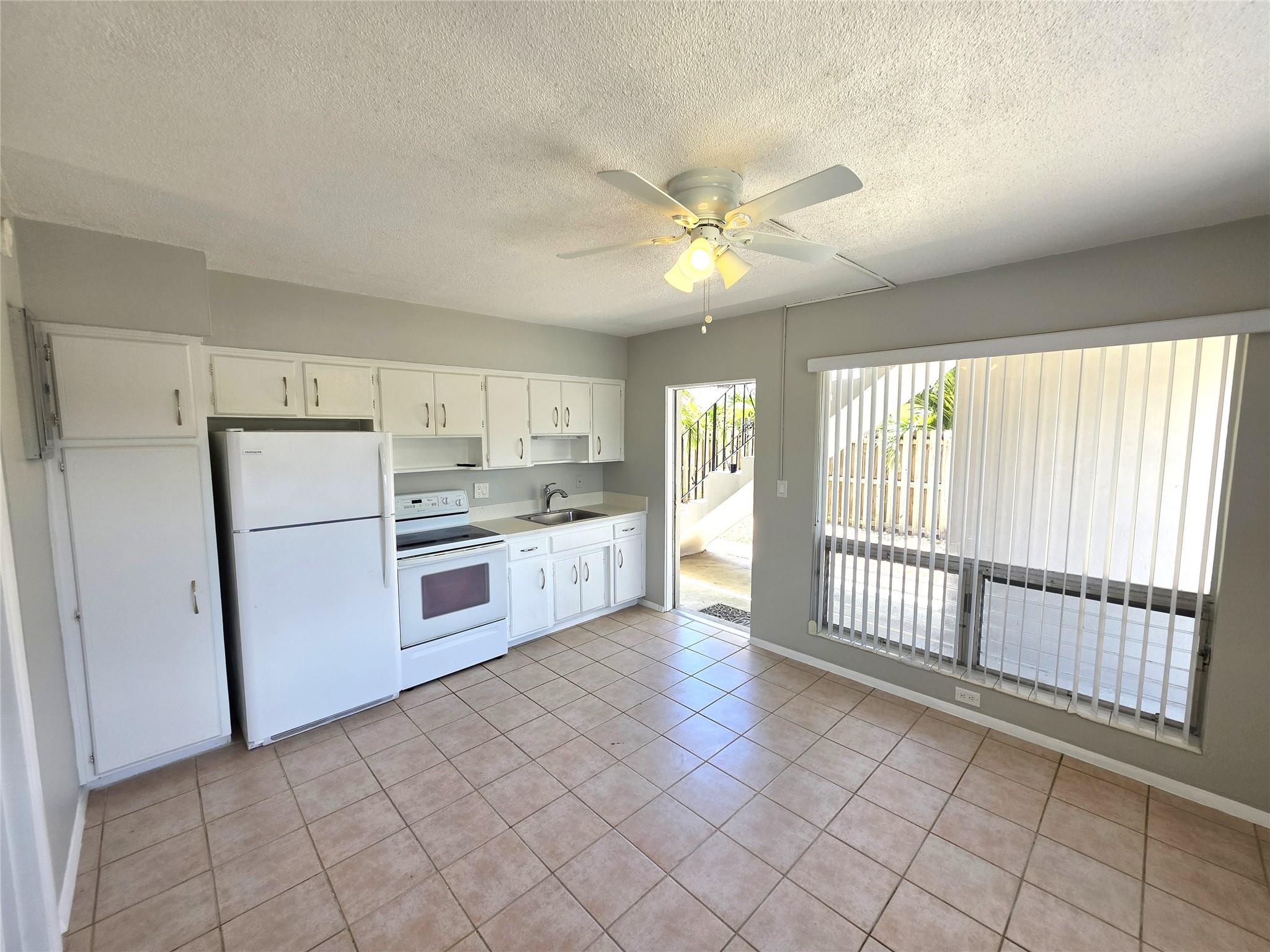 Convenient to Oakland Pk Blvd & Fed Hwy bus lines, shops and restaurants. Walk to Publix, Target, Coral Ridge Mall, Gym, Theater, etc. End unit in back of building allows for additional privacy and 3 sides of windows for additional natural light and air. Tile floors throughout. Walk-in closet. Ceiling fan. W/D on site. 1 dog or cat up to 20# allowed w/ $150 non-refundable pet fee - no Rottweilers, Shepherds, Dobermans or Pitbulls. Tenant to pick up after dog. $200 non-refundable redecorating/cleaning fee due at move in. If 2 cars, 2nd parks behind the other.