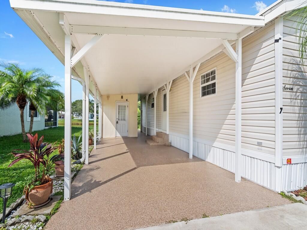 Photo of 7 Violetta Lane, Port Saint Lucie, FL 34952 (MLS # R11122868)