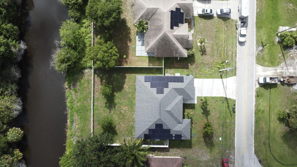 Photo of 115 SW Glenwood Drive, Port Saint Lucie, FL 34984 (MLS # R10997607)