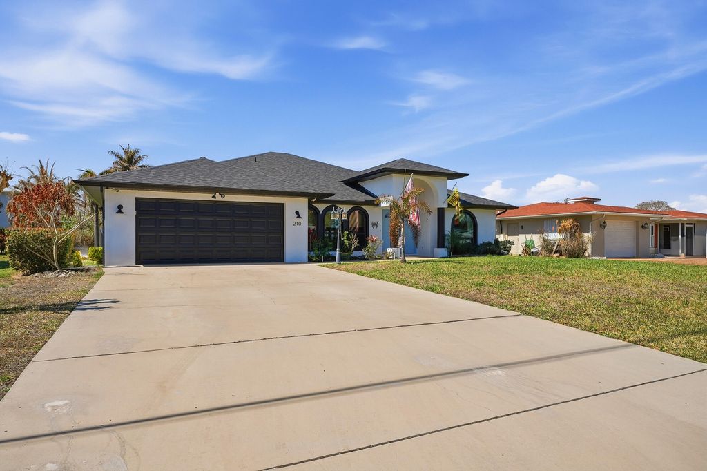 Photo of 210 Ramie Lane, Port Saint Lucie, FL 34952 (MLS # R11166829)