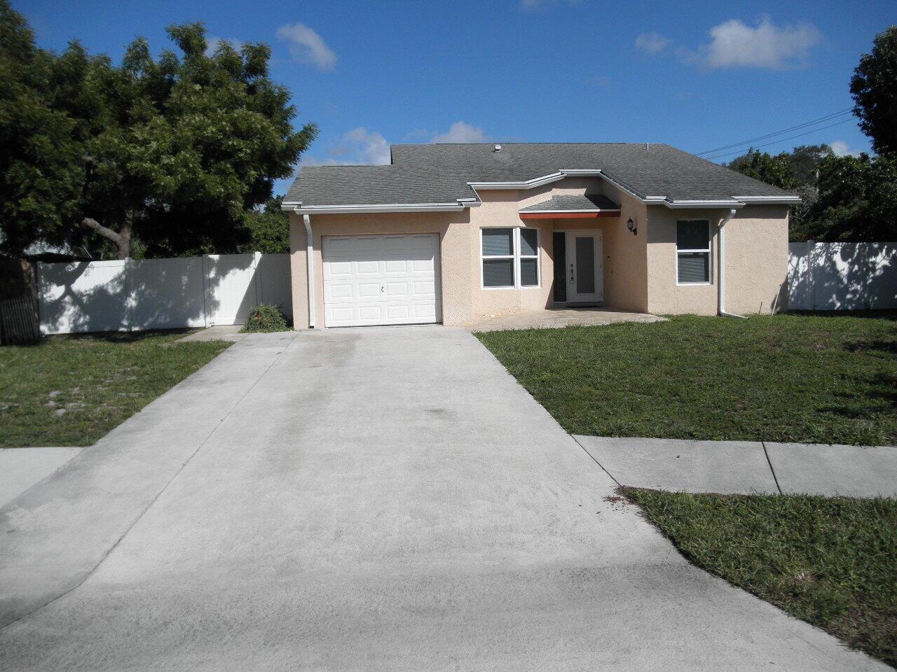 This Beautiful Home is a Tropical Paradise with a large private backyard and an oversized open patio with custom floor tiles for entertainment. All tile in the living areas, upgraded kitchen appliances, breakfast nook, garage has been enclosed to be an office or a den, large laundry room, hurricane impact windows and lawn service included.