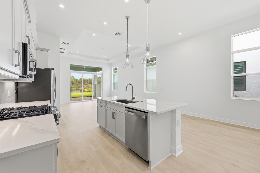 Photo of 140 SE Via Tirso, Port Saint Lucie, FL 34952 (MLS # B26013436)