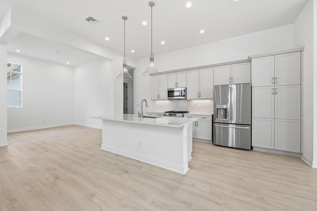 Photo of 140 SE Via Tirso, Port Saint Lucie, FL 34952 (MLS # B26013436)