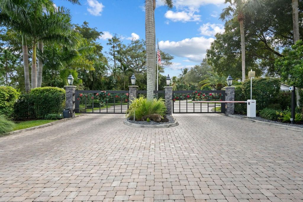 Photo of 2920 Oak Tree Drive, Oakland Park, FL 33309 (MLS # F10543579)