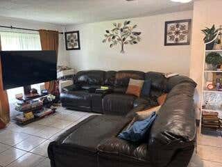 Photo of 1370 NW 54th Terrace, Lauderhill, FL 33313 (MLS # B26035133)