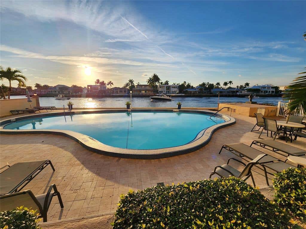 Photo of 299 N Riverside Drive #604, Pompano Beach, FL 33062 (MLS # B26043428)